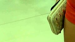 Young girl flaunts tight ass in market shorts