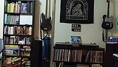 Blonde in black skirt strips teasingly