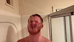 Young gay man masturbates in the shower