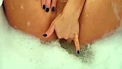 Young European college girl masturbates in the bathroom after class