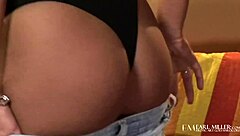 slender coed reagan manx licks and finger fucks her tight twat on the couch, posing with big tits and tattoo