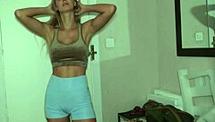 A beautiful blonde woman surprises her delivery guy