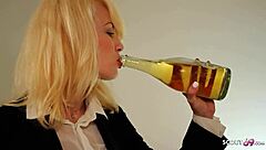 Redhead MILF with big ass and tits gives blowjob, bent over for creampie POV.