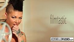 Hot jezebelle works her pussy on the couch fingering boobs stockings milf tattoo natural tits solo lingerie