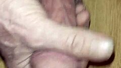 A 14-year-old boy masturbating