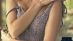 Russian milf model poses naked outdoors in nature