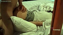 Young girl moves buttocks while penetrated by older men.