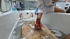 Stepmom walks in to wash her naked stepson, ignoring his excitement. She flashes big tits while he jerks off.