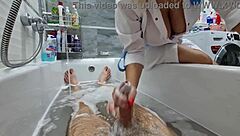 Stepmom walks in to wash her naked stepson, ignoring his excitement. She flashes big tits while he jerks off.