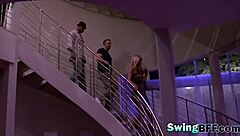 Swingers having fun at night in the city