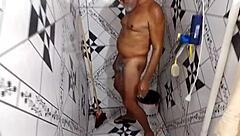 Gugu says, 'Dancing with hard cock in bathroom'