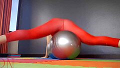 Yoga instructor in skimpy attire teaches flexible moves