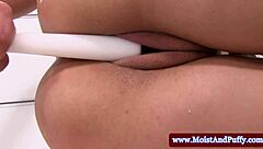 the teen 18+ explores her puffy peach with a toy close up