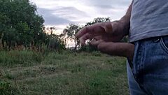 Young student masturbates outdoors for beautiful girl's pleasure