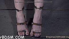 Beauty tied upside down! Her snatch gets thrashed hard in garage!