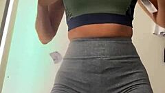 Wife Changing Clothes In Store Fitting Room.