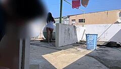 I have a great view of my neighbor’s big natural boobs while she is hanging the clothes