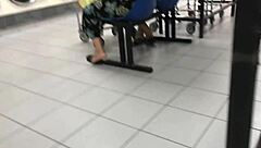 2 Hispanic ladies in flannel skirts at laundromat