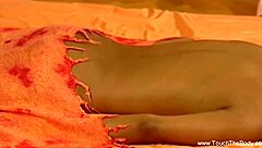 Steamy massage scene with a sexy brunette masseuse and her lucky client