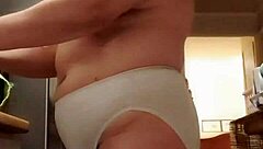 my wife lounges in big panties in the kitchen, teasing me softly