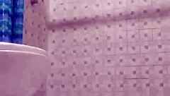 Hidden camera in shower. Spying on mature stepmother.