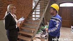 A blonde beauty gets a facial from a construction worker