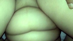 Close up of an Asian amateur’s pussy with milk stains on her red lips after being fucked by an amateur