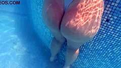 Solo girl enjoys herself in the pool