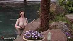 Misha Lowe flaunts massive tits by the pool