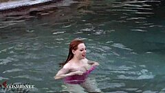 Misha Lowe flaunts massive tits by the pool