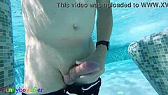 gay guy discreetly stroking his thick cock in hot thermal pool