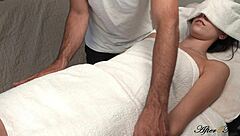 Pervert masseur fingers teen’s pussy during steamy session