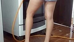 Detailed Footage Of My Naked Employee Washing The Stove, Revealing Her Amateur Fetish Side.