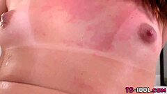 latina tgirl in lingerie performs blowjob on cock