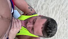 Intense public blowjob on gay beach outdoors
