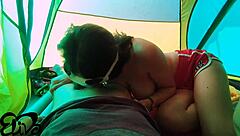 Beautiful girl with great assets has a hot blowjob in the tent