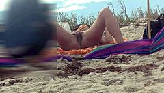 Seductive MILF Handjobs Stranger on Nude Beach