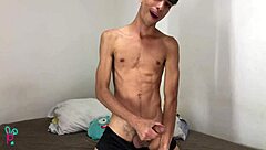Latino with huge cock masturbates while watching gay porn!