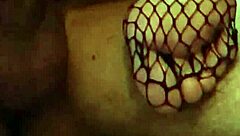 Foot fetish guy fucks her deliciously, cumming on her fishnet feet.