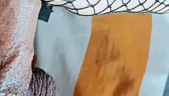 Foot fetish guy fucks her deliciously, cumming on her fishnet feet.