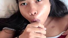Young Thai girl choked while trying to swallow cum