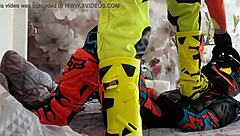 gay biker treads boots in motocross scene