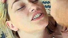 Closeup of dirty talking blonde hotwife giving blowjob and receiving facial