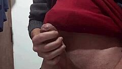 i'm jerking off with my clothes on, feeling the skinny cock in my hand as i masturbate alone.