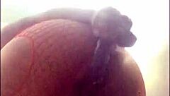 Ebony whore squirts hard on homemade dildo