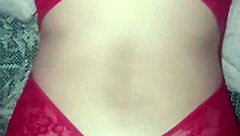 red lingerie soaked in cum from a wild group session with swingers