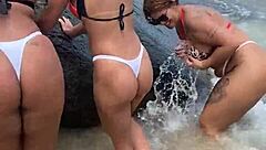 Watch us horny girls fucking on the beach in group lesbian action