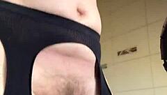 hairy milf does a fetish workout in fishnets at the gym