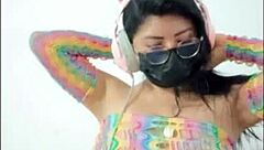 Beautiful woman inserts pink dildo into wet pussy in softcore solo scene.