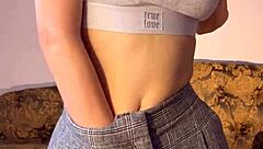 Petite teen 18+ reaches orgasm with dildo in tight pussy striptease solo session.